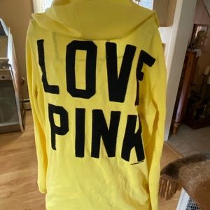 Pink Victoria’s Secret jacket gently loved bright yellow with black lettering